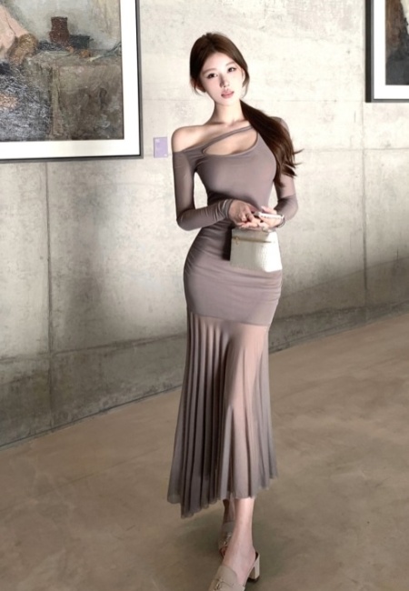 Hollow long sleeve slim long sloping shoulder dress