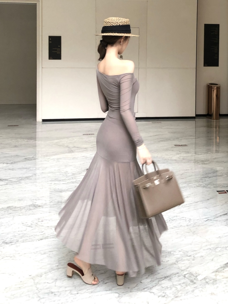 Hollow long sleeve slim long sloping shoulder dress