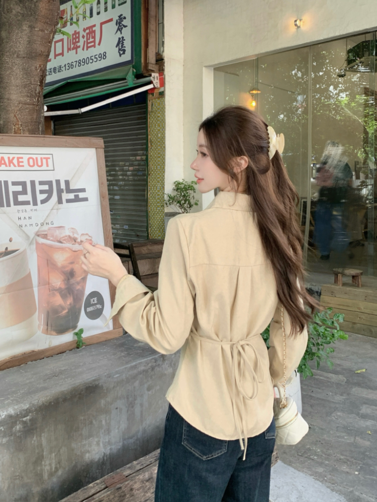 Pinched waist lapel shirt France style oblique buckle tops