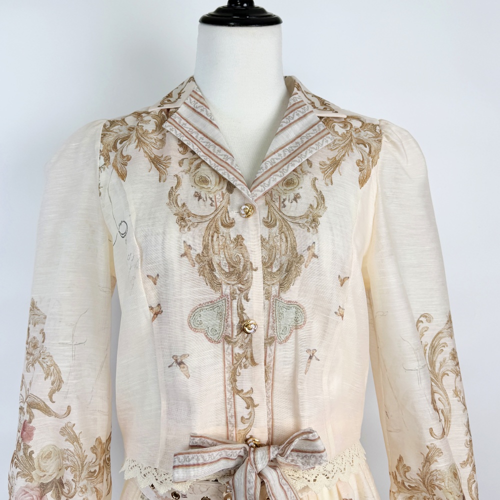 Stitching short tops printing long skirt a set