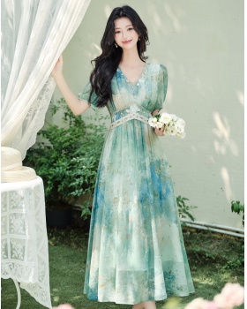 Artistic summer green Bohemian style blooming dress