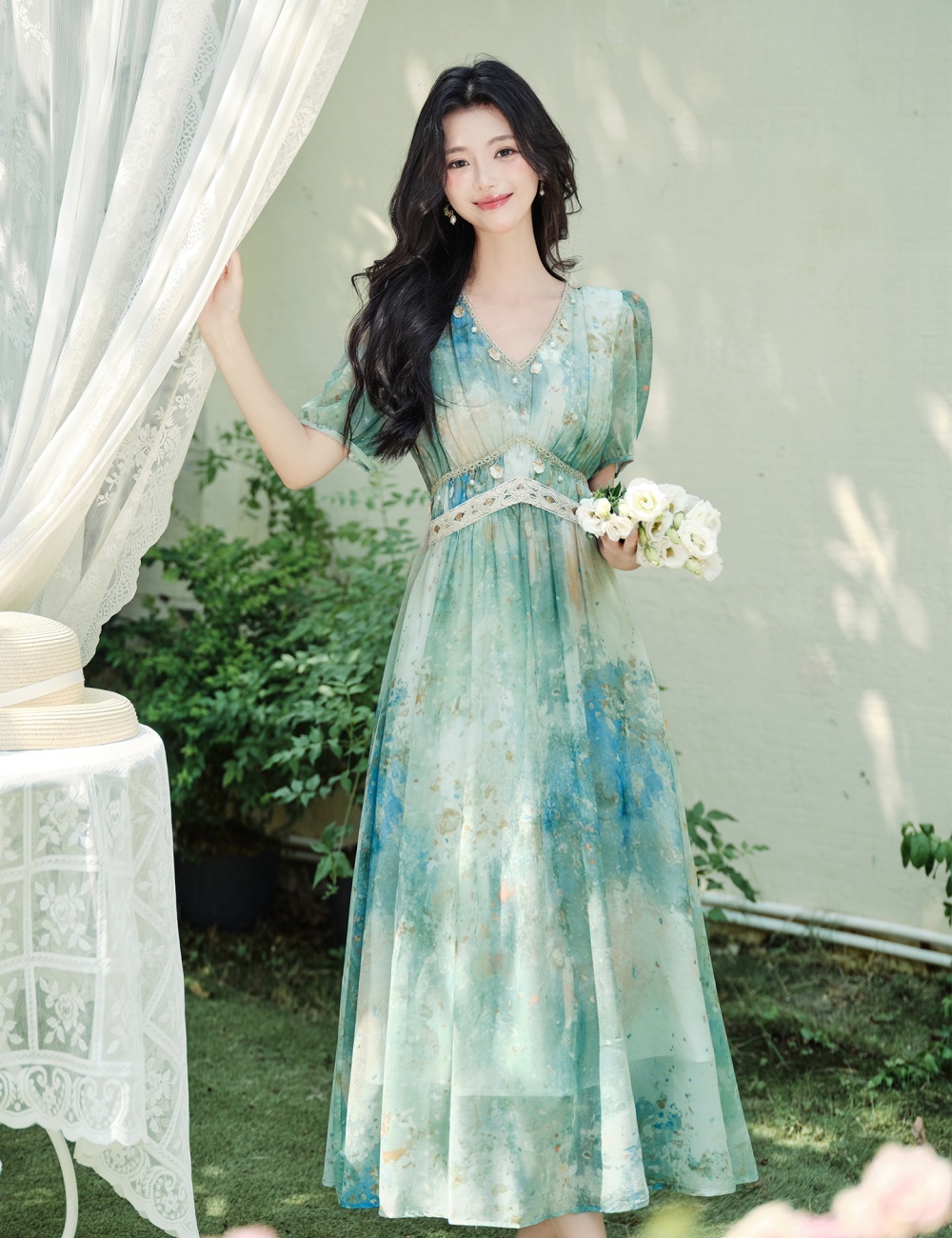 Artistic summer green Bohemian style blooming dress
