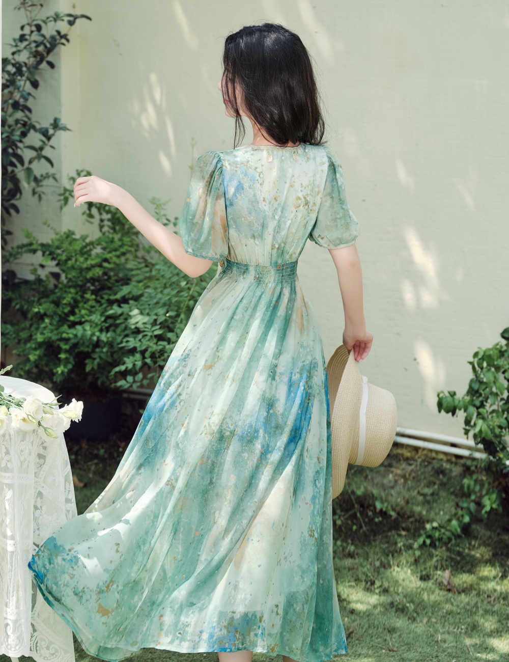 Artistic summer green Bohemian style blooming dress